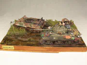 WWII military diorama titled Wittmann's Last Tiger, featuring a German tank wreck and an American Sherman Firefly with a Polish crew - photo No. 1 - front view
