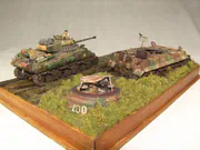 WWII military diorama titled Wittmann's Last Tiger, featuring a German tank wreck and an American Sherman Firefly with a Polish crew - photo No. 3 - side view