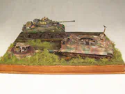 WWII military diorama titled Wittmann's Last Tiger, featuring a German tank wreck and an American Sherman Firefly with a Polish crew - photo No. 4 - rear view