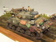 WWII military diorama titled Wittmann's Last Tiger, featuring a German tank wreck and an American Sherman Firefly with a Polish crew - photo No. 8 - close-up