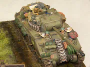 WWII military diorama titled Wittmann's Last Tiger, featuring a German tank wreck and an American Sherman Firefly with a Polish crew - photo No. 11 - close-up