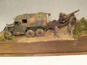 Plastic models of a Scammell Pioneer artillery tractor and a howitzer on a narrow road in an Italy 1943 WWII diorama - photo No. 3 - rear view
