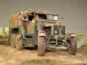Plastic models of a Scammell Pioneer artillery tractor and a howitzer on a narrow road in an Italy 1943 WWII diorama - photo No. 5 - close-up