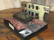 Diorama: the soviet self-propelled gun stands on Wrocławska Street in Lubań in March 1945 - photo No. 1 - side view