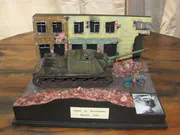 Diorama: the soviet self-propelled gun stands on Wrocławska Street in Lubań in March 1945 - photo No. 2 - front view