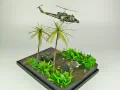 Link to photos of the diorama featuring a damaged M113 armored personnel carrier towing by an elephant and the Bell UH-1B helicopter flying over them. Vietnam 1970.