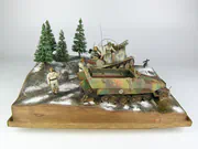 1:35 scale Ardennes Offensive 1944 diorama featuring plastic models of the German Grille Ausf. H and Sd.Kfz. 251 Ausf. D vehicles - photo No. 1 - front view