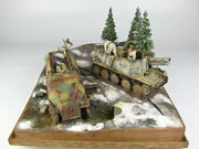 1:35 scale Ardennes Offensive 1944 diorama featuring plastic models of the German Grille Ausf. H and Sd.Kfz. 251 Ausf. D vehicles - photo No. 3 - side view
