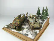 1:35 scale Ardennes Offensive 1944 diorama featuring plastic models of the German Grille Ausf. H and Sd.Kfz. 251 Ausf. D vehicles - photo No. 4 - side view