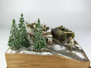 1:35 scale Ardennes Offensive 1944 diorama featuring plastic models of the German Grille Ausf. H and Sd.Kfz. 251 Ausf. D vehicles - photo No. 7 - side view