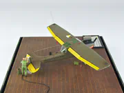 Plastic model of the American Cessna O-1D observation and liaison aircraft from the Vietnam War period - photo No. 4 - side view