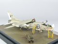 The photo shows a plastic model of the American single-seat F-8E Crusader carrier-based fighter aircraft assembled on a 1:72 scale. The model represents the F-8E aircraft from times of the Vietnam War. Photo No. 7